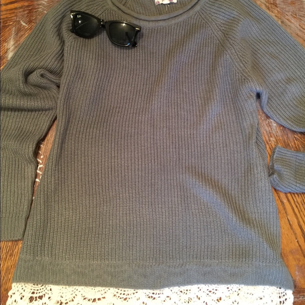 Grey sweater with lace edge detail